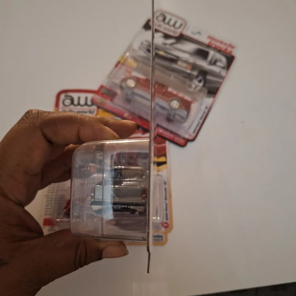 2024 AUTO WORLD Muscle Trucks 2006 Chevy Silverado SS Silver,Red + Ultra Red Lot
